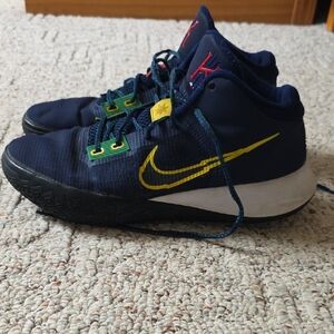 Nike Navy Athletic Shoes with Yellow Swoosh